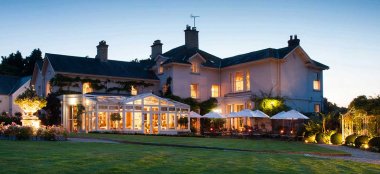 External Night At Summer Lodge Award Winning Wedding Venue Dorset Gay Wedding Guide 9 380X174