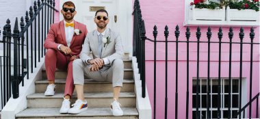 Gay Grooms Sitting On Stairs Josephine Elvis 1440X660 1 6 380X174