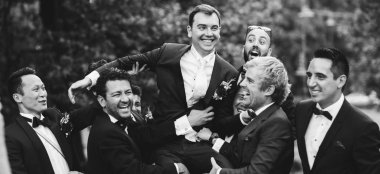 Groom Being Lifted By Groomsmen By Wedding Planner La Fete Gay Wedding Guide 6 380X174