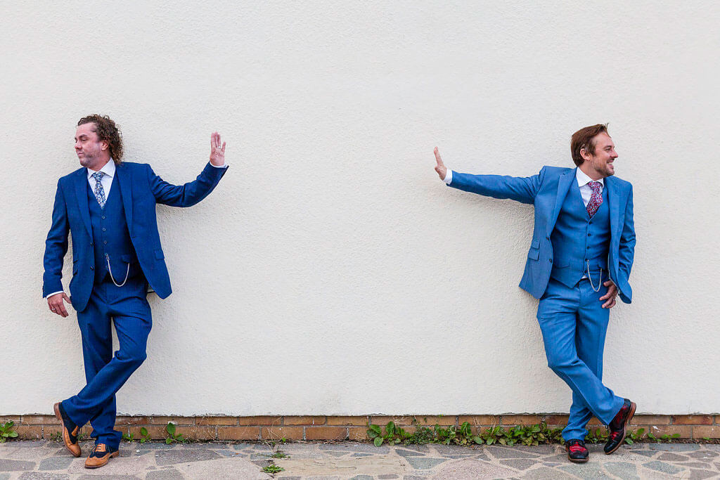 leaning against a wall Real Gay Wedding of Shaun and Carl via The Gay Wedding Guide images by Ross Willsher 3 5
