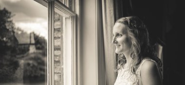 Lesbian Bride Looks Out Of Window Image By Lesbian Wedding Photography Pike Photography Via Gay Wedding Guide 6 380X174