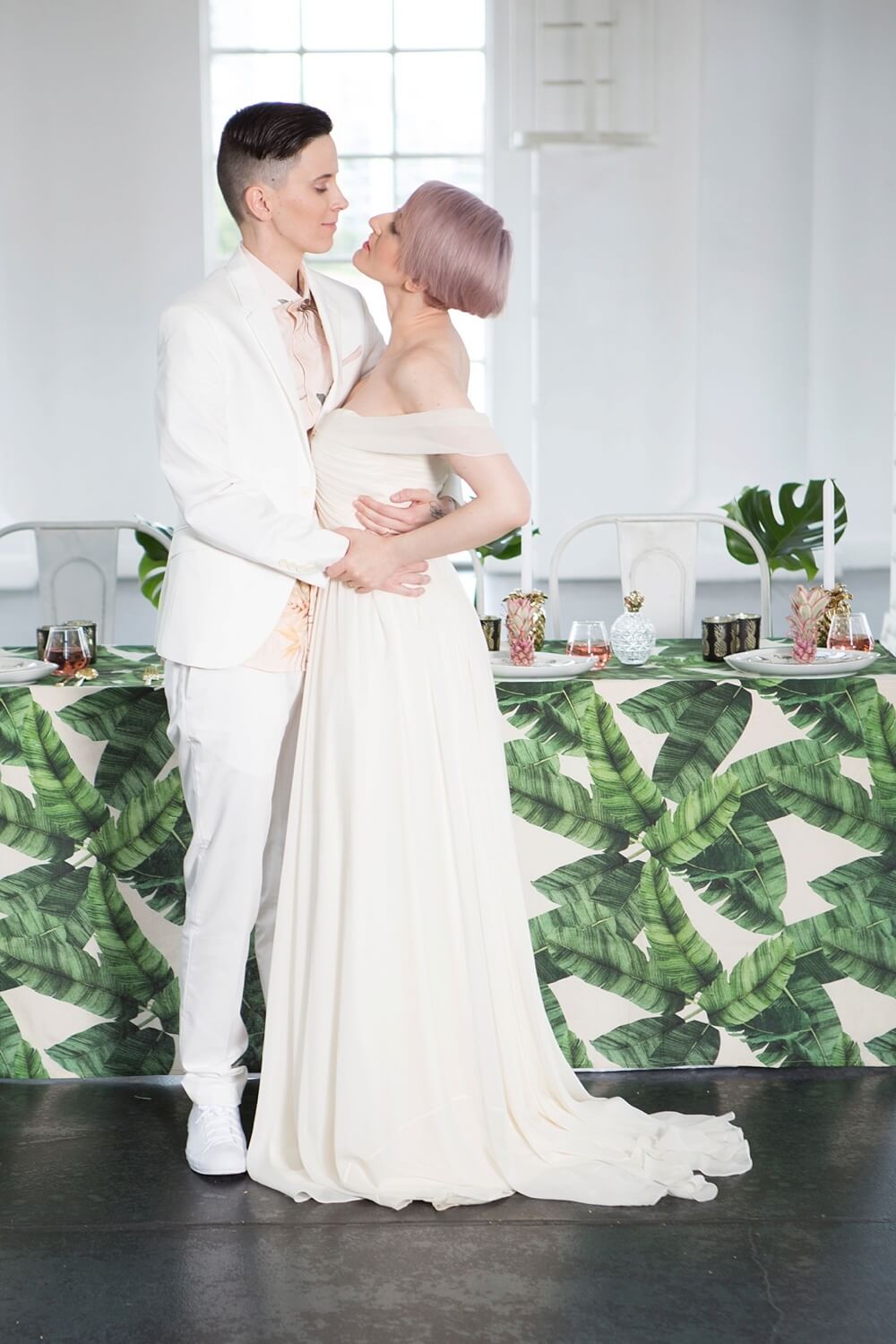 lesbian brides at exotic tropical wedding theme styled shoot by paola de paola via the gay wedding guide 8