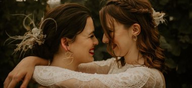Lesbian Brides Kiss Vines At Brickhouse Vineyard Country Wedding Venue Devon Via The Gay Wedding Guide 9 380X174