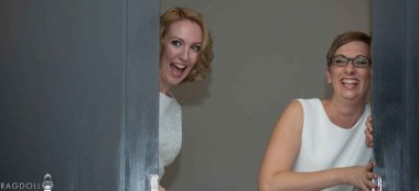 Lesbian Brides Peep Around Door Image By Staffordshire Wedding Photographer Ragdoll Photography Via The Gay Wedding Guide 6 380X174