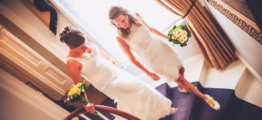 Lesbian Brides Walk Down The Stairs Image By Lesbian Wedding Photography Pike Photography Via Gay Wedding Guide 6 380X174