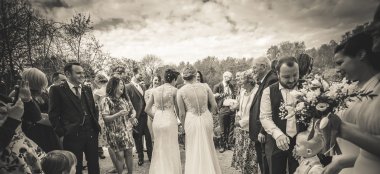 Lesbian Brides Walk Out To Guests Image By Lesbian Wedding Photography Pike Photography Via Gay Wedding Guide 6 380X174