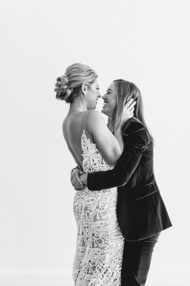 lesbian wedding of Rachel Marianne hug image copyright Elaine Palladino Photography via Gay Wedding Guide 1 5