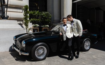 Michael Leaning Over Derrick By The Black Car At Their Gay Wedding 3 5 368X229