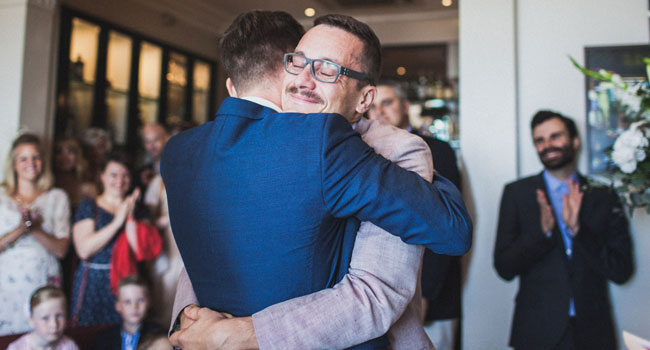 michaelgordon brighton same sex wedding hug held at drakes hotel featured on the gay wedding guide 3 5