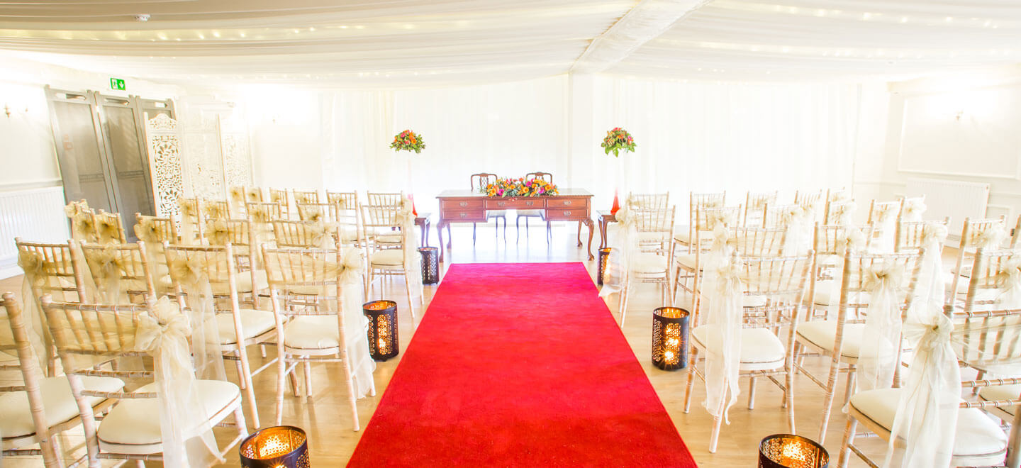 red carpet aisle at Southdowns Manor Luxury Gay Wedding Venue in Hampshire 9