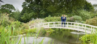 Same Sex Wedding On Bridge At Fennes Gay Wedding Venue In Essex Via The Gay Wedding Guide 9 380X174