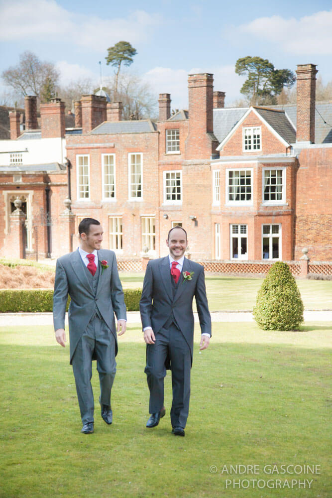 walking through gardnes Phil and Leo at their gay wedding in surrye image copyright Andre Gascoine via the Gay Wedding Guide 3 5