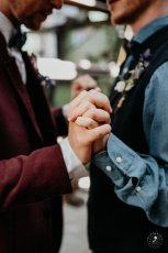 Grooms Hold Hands Portrait At Styled Gay Wedding Shoot At Germany Fabric Factory.1 Image By Juliabartelt 1 5 153X230