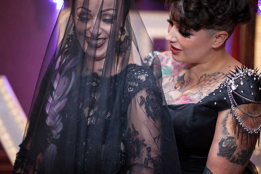 LGBT wedding Lesbian Wedding styled shoot heavy metal wedding details tattoed brides Paola de Paola Photography 56 1 5