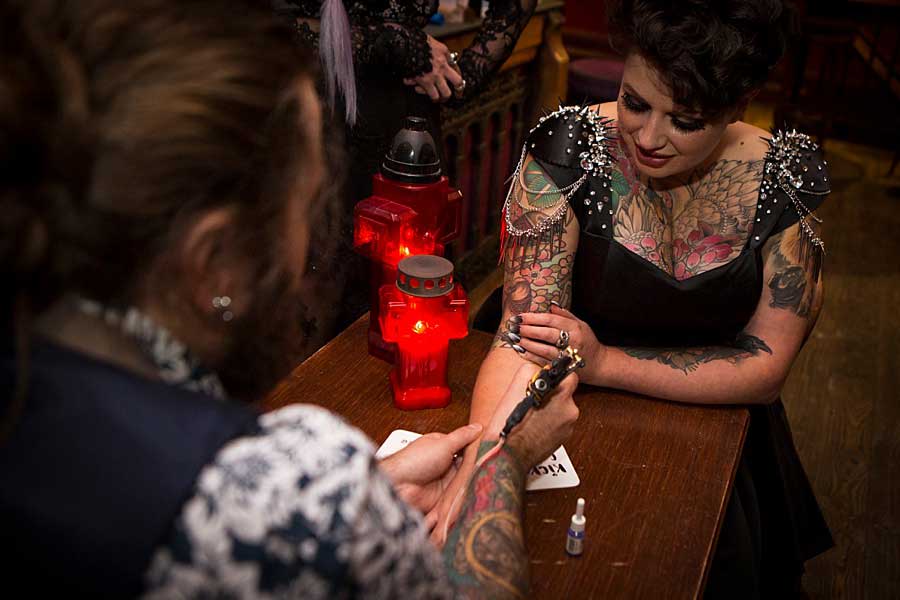 LGBT wedding Lesbian Wedding styled shoot heavy metal wedding details tattoed brides Paola de Paola Photography 87 1 5