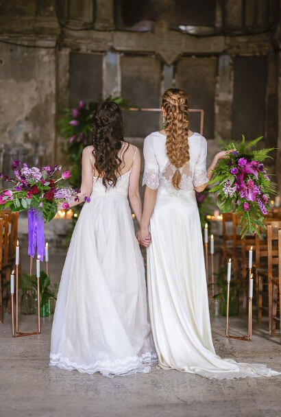 Models as brides holding bouquets at Gothic and Purple wedding ideas Styled Shoot via The Gay Wedding Guide 1 5
