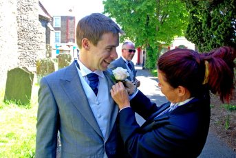 Lady Toastmaster Attaching Grooms Button Hole 2 343X230