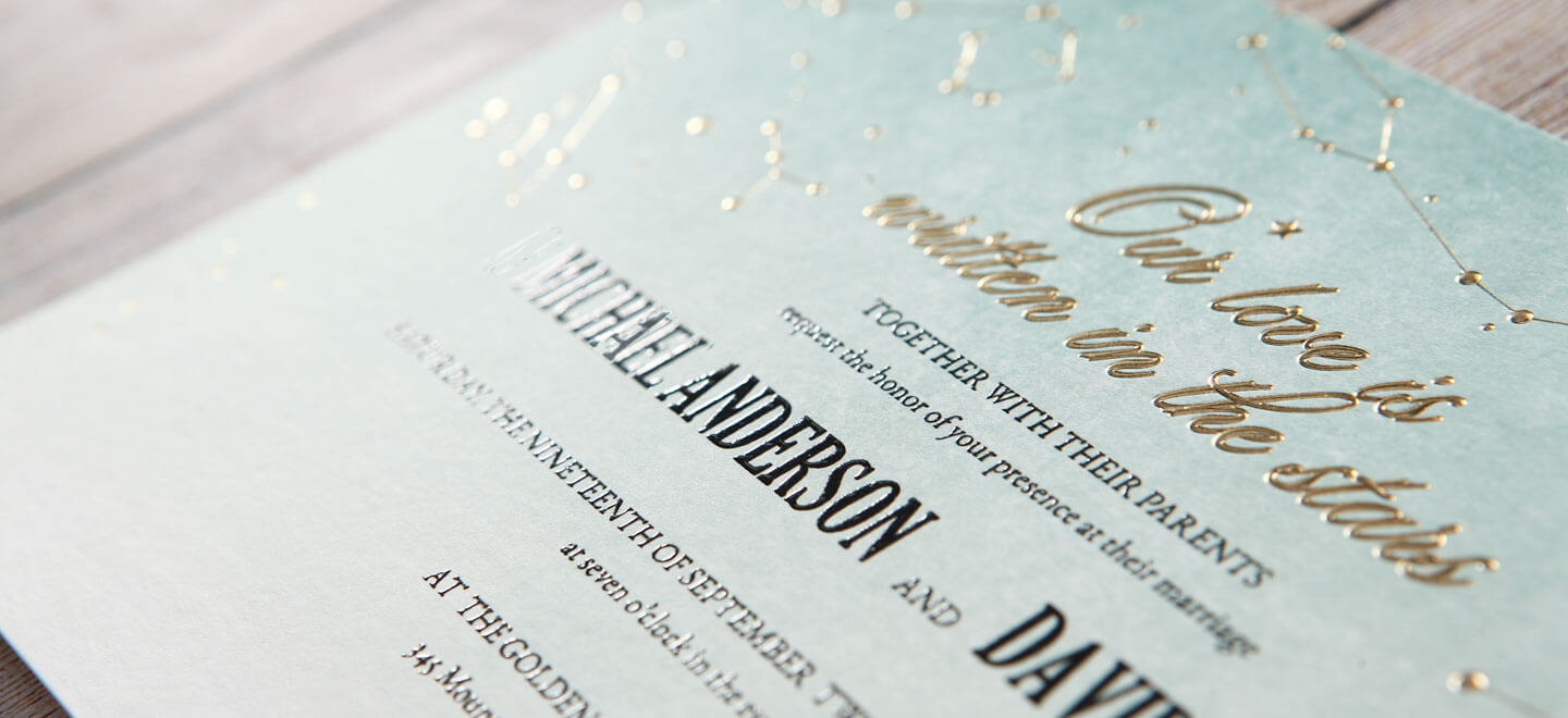 Embossed-Blue-And-Cream-Wedding-Invitation-By-Brilliant-Wedding-Stationery-And-Laser-Cut-Wedding-Stationery-Adorn-Invitations-Via-Gay-Wedding-Guide