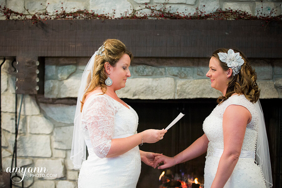 Katie And Shanaka Lesbian Winter Wedding Red Berries On Fireplace Vows Image By Amy Ann Photography 2 - Six Stylish Same-Sex Winter Weddings Katie And Shanaka Lesbian Winter Wedding Red Berries On Fireplace Vows Image By Amy Ann Photography 2 - Six Stylish Same-Sex Winter Weddings Gay Wedding Guide