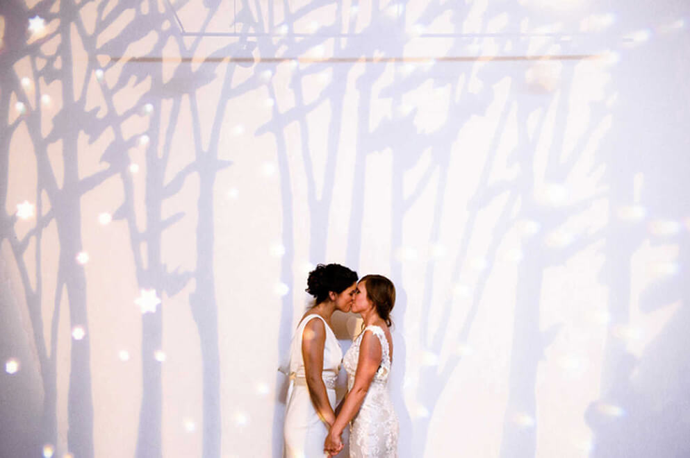 Michelle And Robyn Lesbian Winter Wedding Projection Photo By Hoyt Photography Via Gay Wedding Guide 2 - Six Stylish Same-Sex Winter Weddings Michelle And Robyn Lesbian Winter Wedding Projection Photo By Hoyt Photography Via Gay Wedding Guide 2 - Six Stylish Same-Sex Winter Weddings Gay Wedding Guide