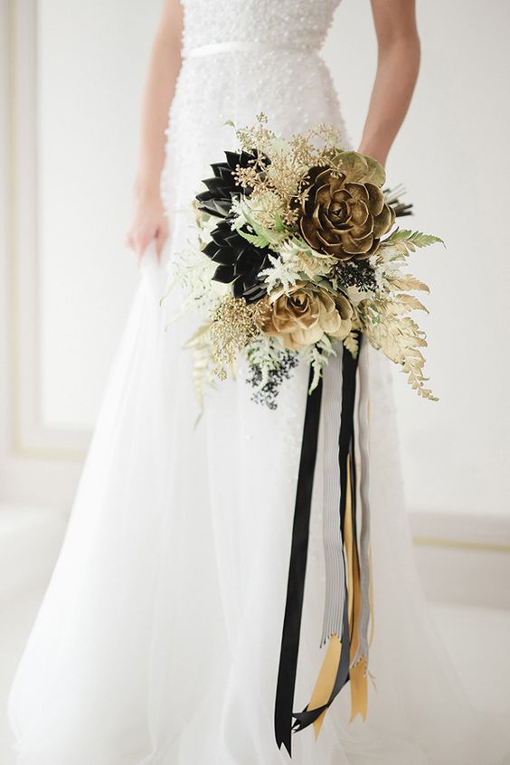 Black And Gold Bouquet Via Gay Wedding Guide 2 - Style Steal: 22 Masquerade Ball Same-Sex Wedding Theme Inspirations To Spice Up Your Wedding Black And Gold Bouquet Via Gay Wedding Guide 2 - Style Steal: 22 Masquerade Ball Same-Sex Wedding Theme Inspirations To Spice Up Your Wedding Gay Wedding Guide