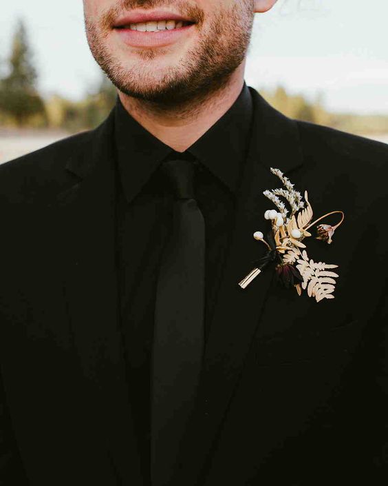 Black Wedding Suit With Natural Boutonnoire Via Gay Wedding Guide 2 - Style Steal: 22 Masquerade Ball Same-Sex Wedding Theme Inspirations To Spice Up Your Wedding Black Wedding Suit With Natural Boutonnoire Via Gay Wedding Guide 2 - Style Steal: 22 Masquerade Ball Same-Sex Wedding Theme Inspirations To Spice Up Your Wedding Gay Wedding Guide