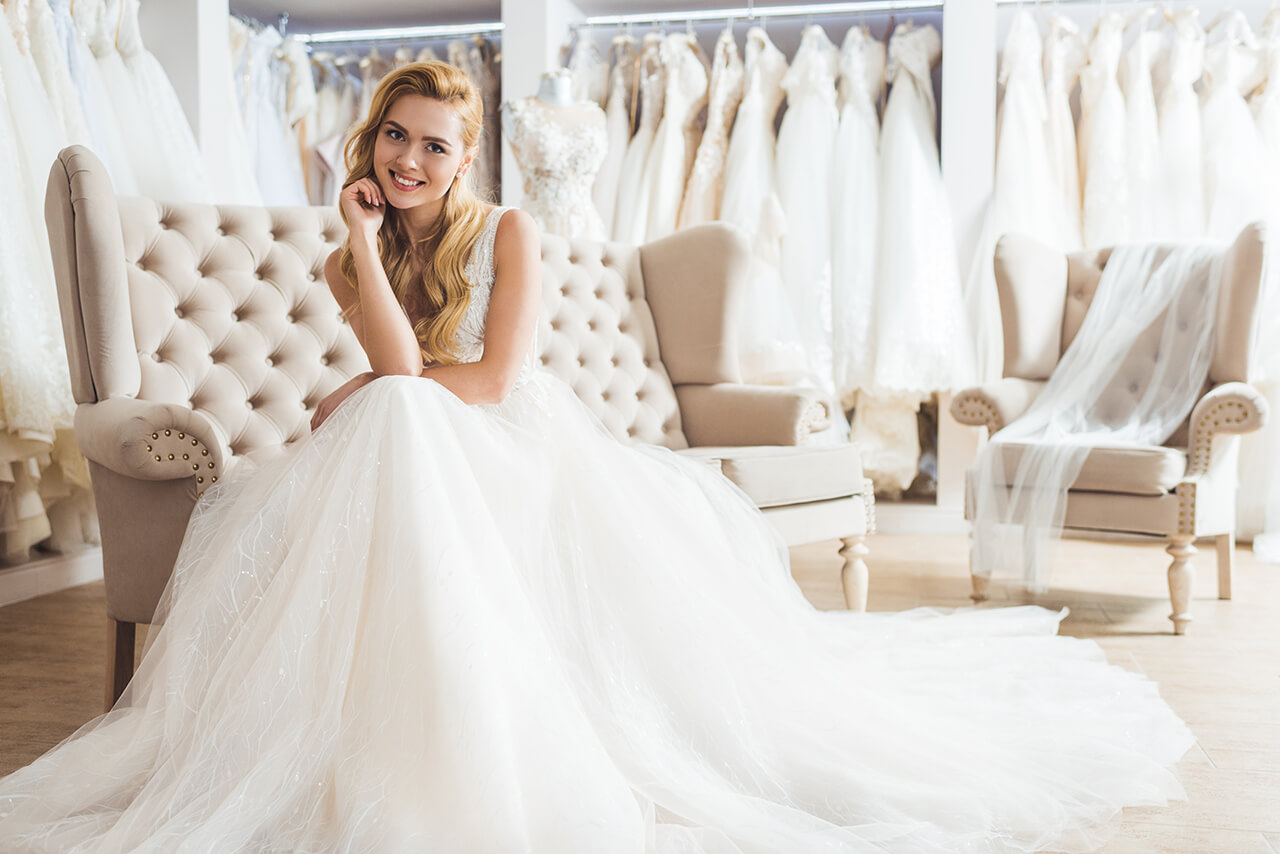 Bride Smiling In Wedding Dress Shop 2 