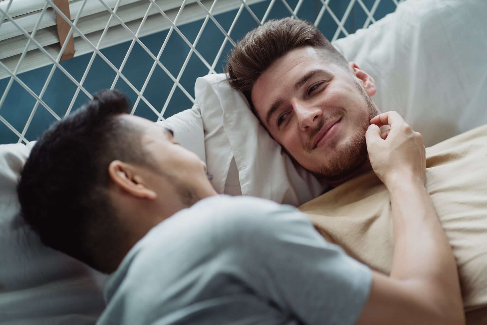 Communication Two Men Smiling In Bed 2 - 9 Communication Strategies To Live Happily Ever After With Your Husband Communication Two Men Smiling In Bed 2 - 9 Communication Strategies To Live Happily Ever After With Your Husband Gay Wedding Guide