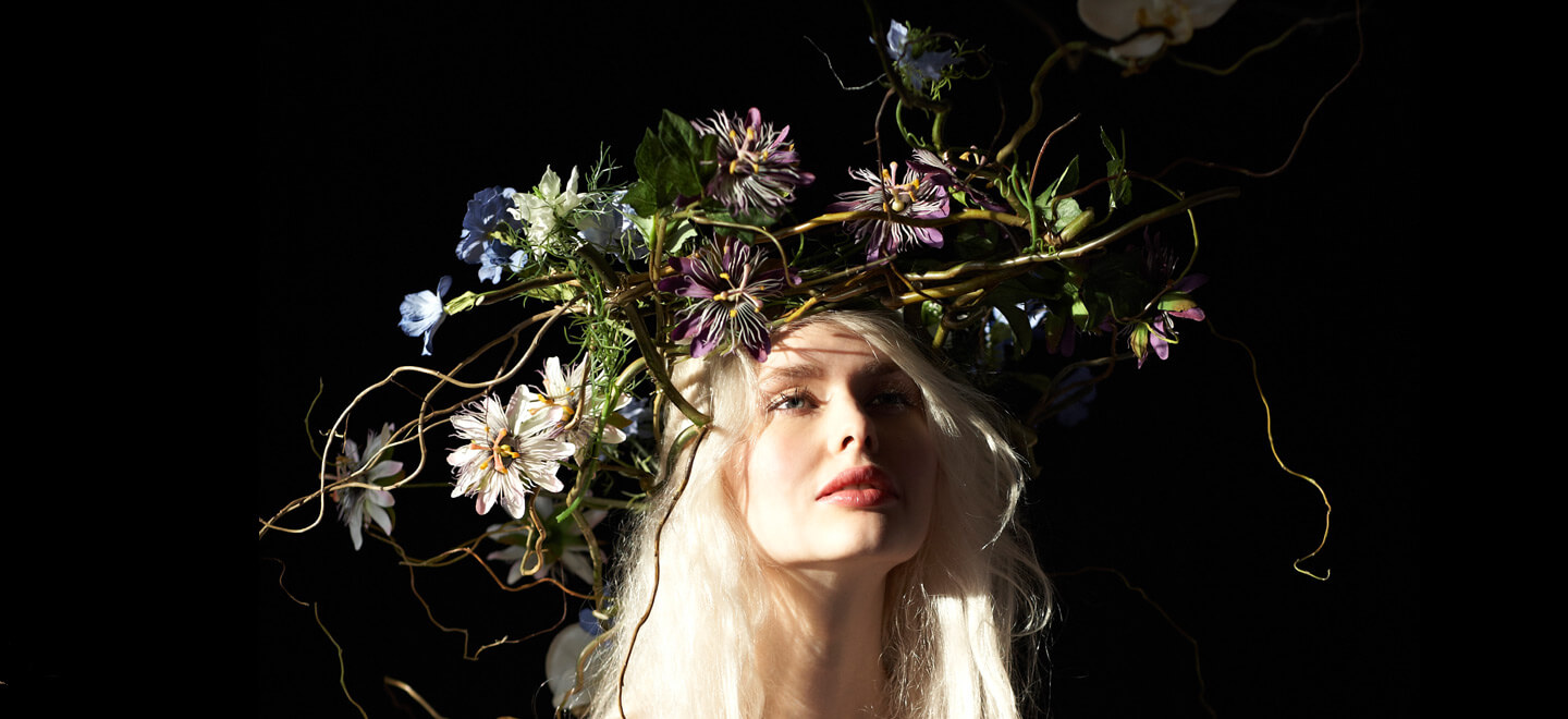Woman wearing Ethereal Floral crown by Harriet Parry
