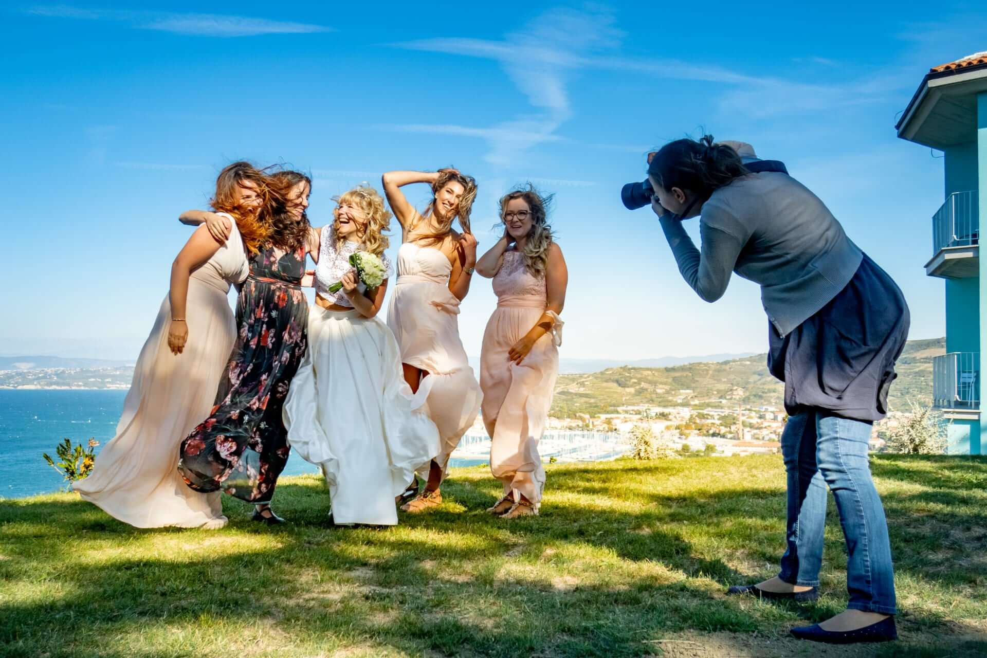 Female Wedding Photographer At Work 2 - How To Choose An Elopement Photographer Female Wedding Photographer At Work 2 - How To Choose An Elopement Photographer Gay Wedding Guide