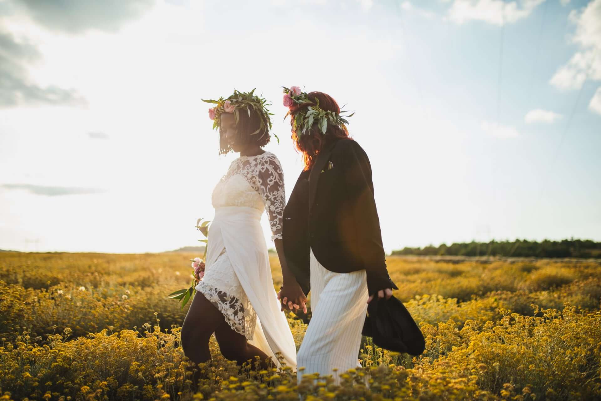 Joyful Gay Couple Having A Walk On Their Wedding Day 2 - How To Choose An Elopement Photographer Joyful Gay Couple Having A Walk On Their Wedding Day 2 - How To Choose An Elopement Photographer Gay Wedding Guide