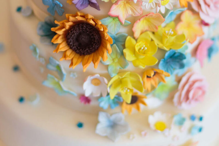 Multicoulored Flower Cake Topper By Thomas William From Unsplash Via Gay Wedding Guide 768X512 1 2 - 40 Awesome Lesbian Wedding Cake Toppers That Will Make Your Wedding Cake Stand Out Multicoulored Flower Cake Topper By Thomas William From Unsplash Via Gay Wedding Guide 768X512 1 2 - 40 Awesome Lesbian Wedding Cake Toppers That Will Make Your Wedding Cake Stand Out Gay Wedding Guide