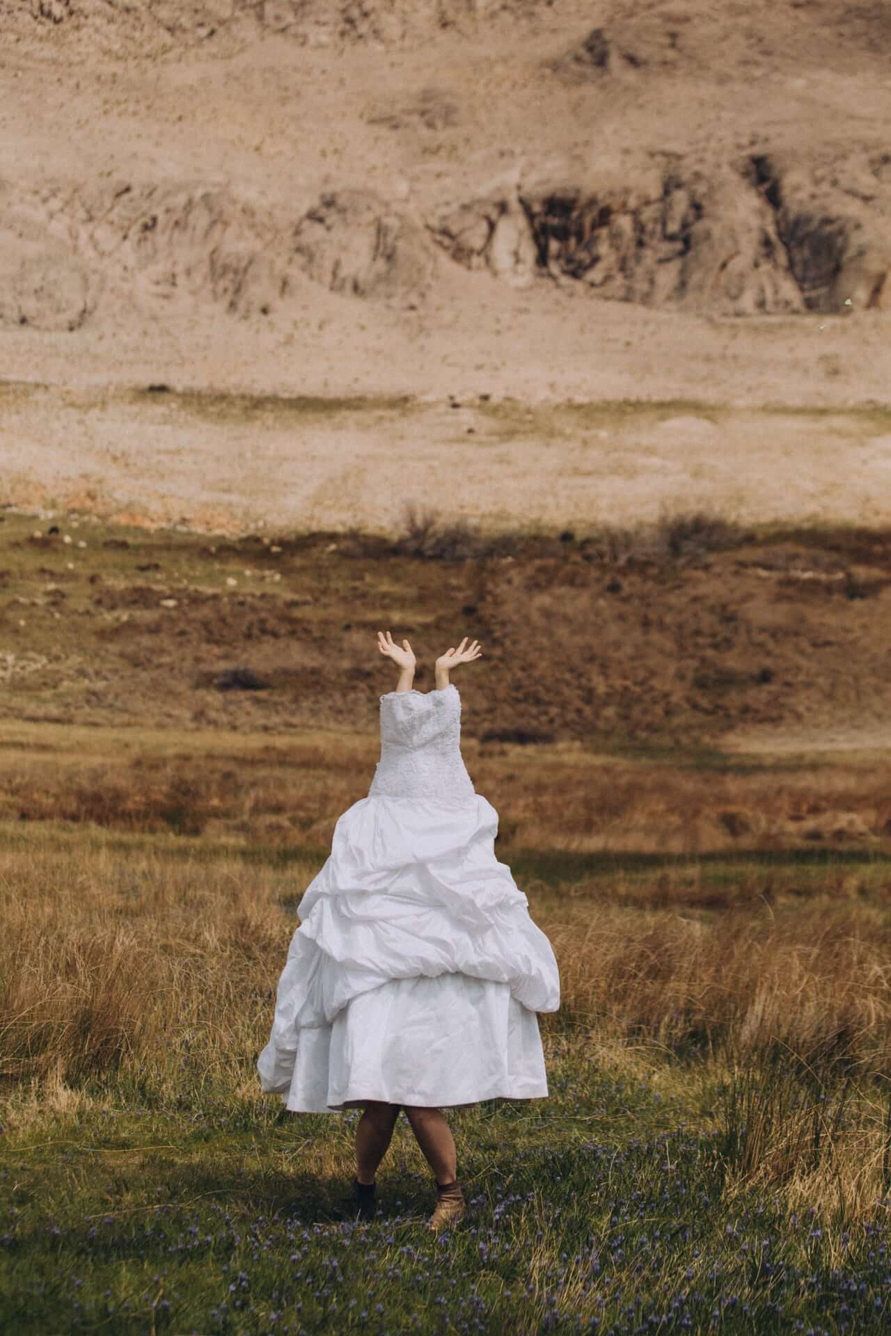 Person Wearing A Wedding Dress 2 - How To Choose An Elopement Photographer Person Wearing A Wedding Dress 2 - How To Choose An Elopement Photographer Gay Wedding Guide