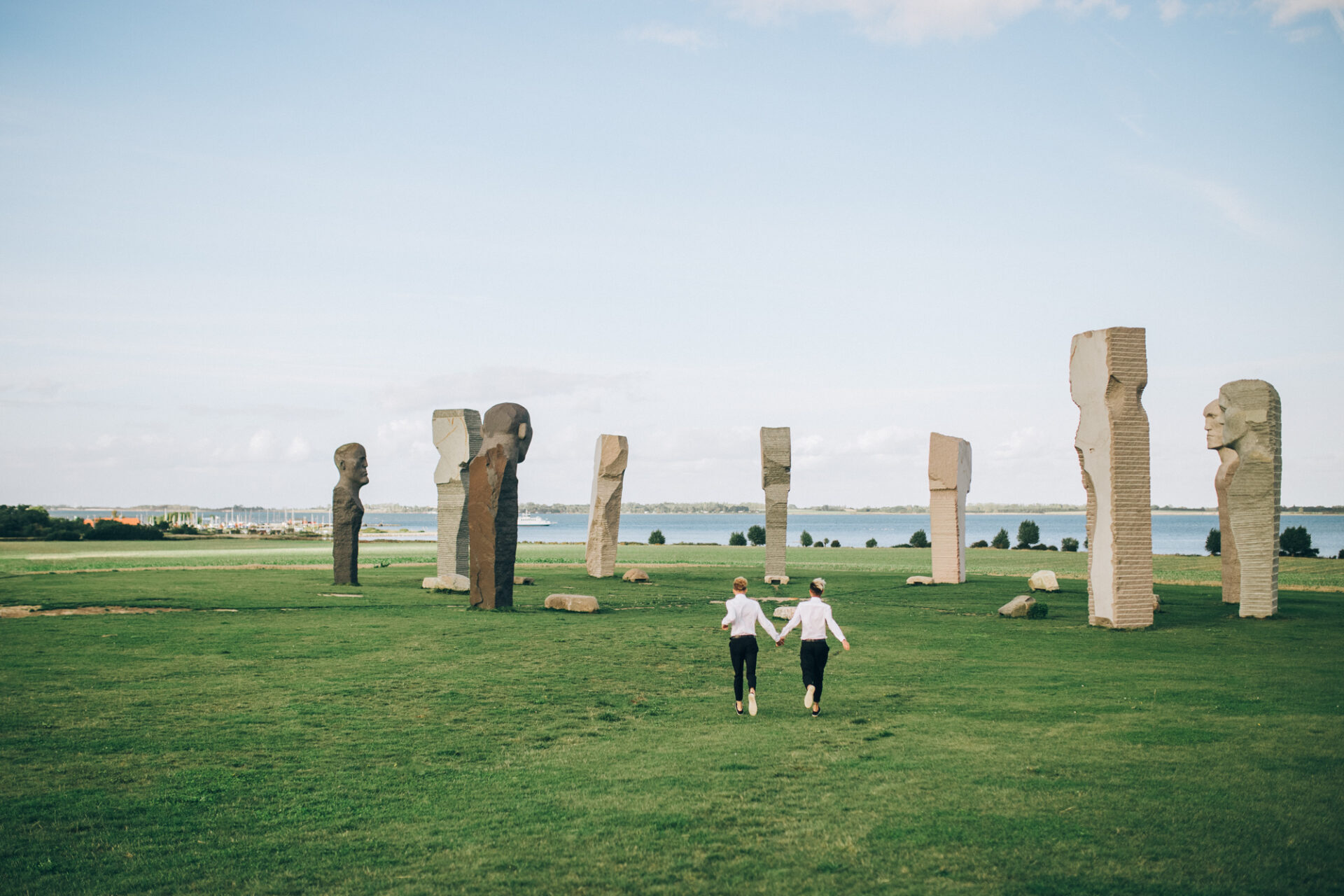 A romantic, laidback LGBT destination wedding on Lolland-Falster islands at the Dodecalith art installation by the sea.