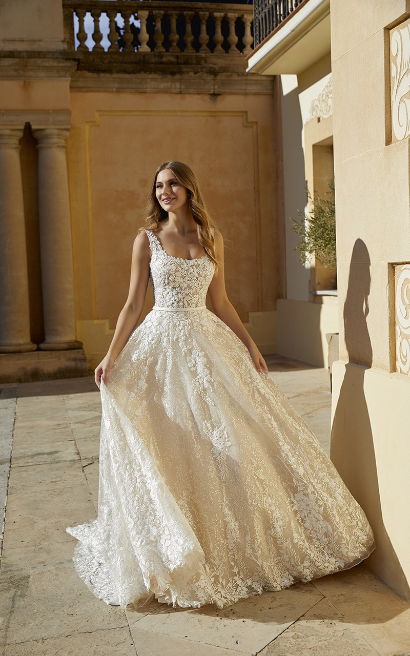 Warm White Wedding Dress Outside Front 2 - Heavenly Same-Sex Autumn Wedding Ideas From The Uk'S Top 10 Lgbtq+ Wedding Suppliers Gay Wedding Guide