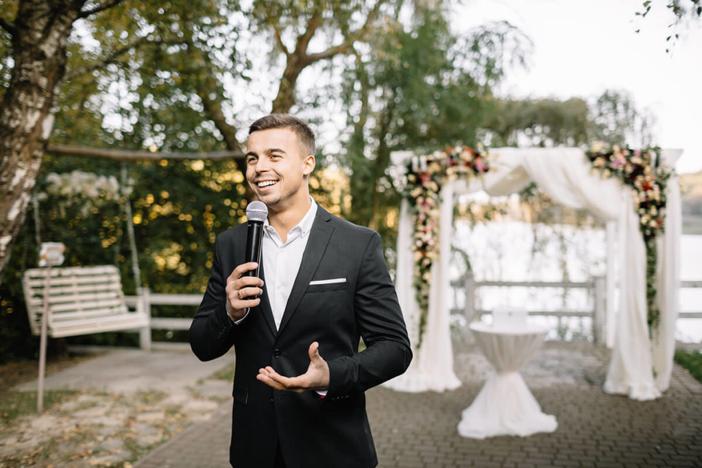 Well Dressed Man Gives A Speech Via Gay Wedding Guide 1024X683 1 2 - Wedding Speeches Ultimate Guide: The Good, The Bad And The Ugly Nail Your Wedding Speech During The Lockdown