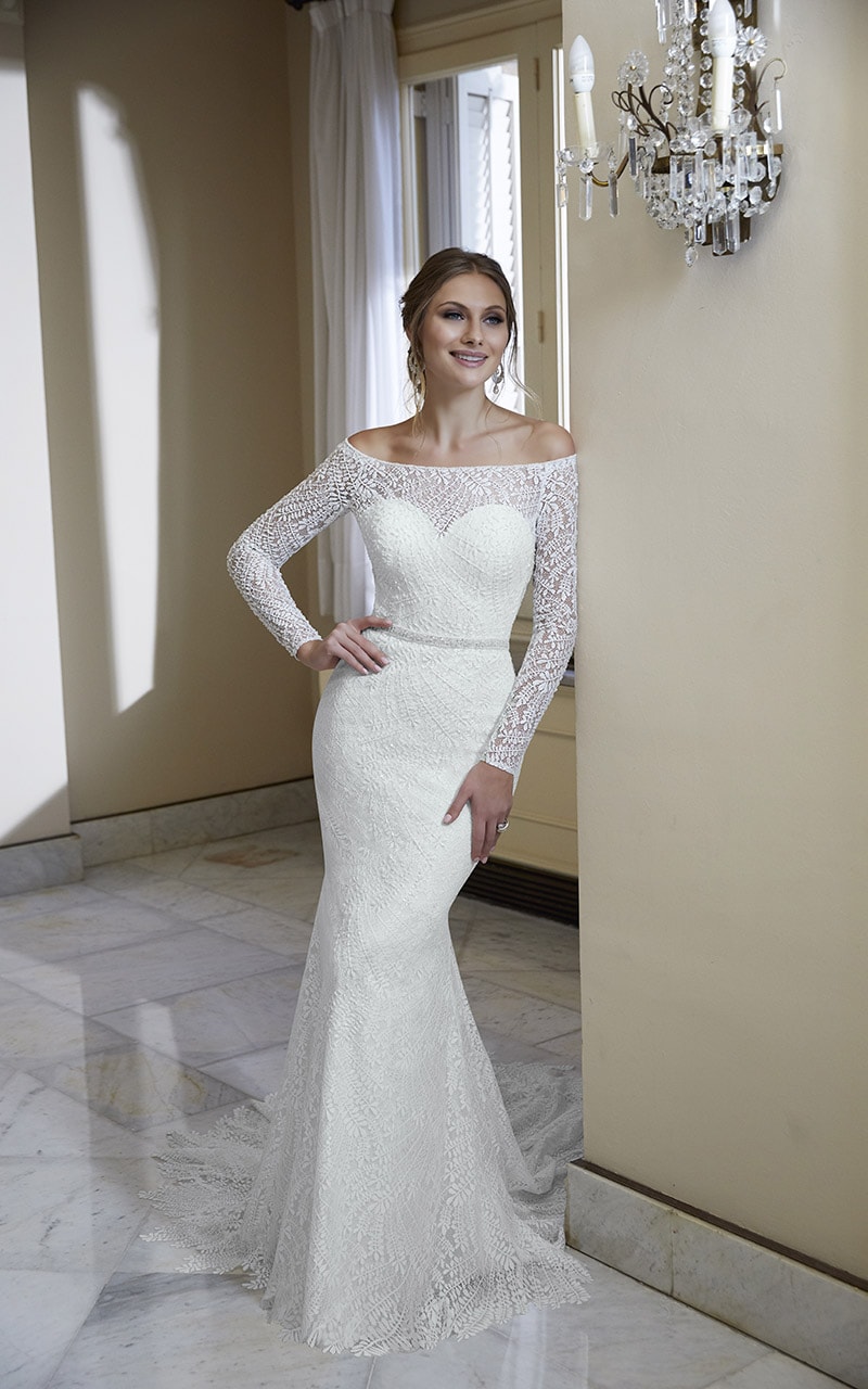 White Wedding Dress Inside By The Wall Front 2 - Heavenly Same-Sex Autumn Wedding Ideas From The Uk'S Top 10 Lgbtq+ Wedding Suppliers Gay Wedding Guide