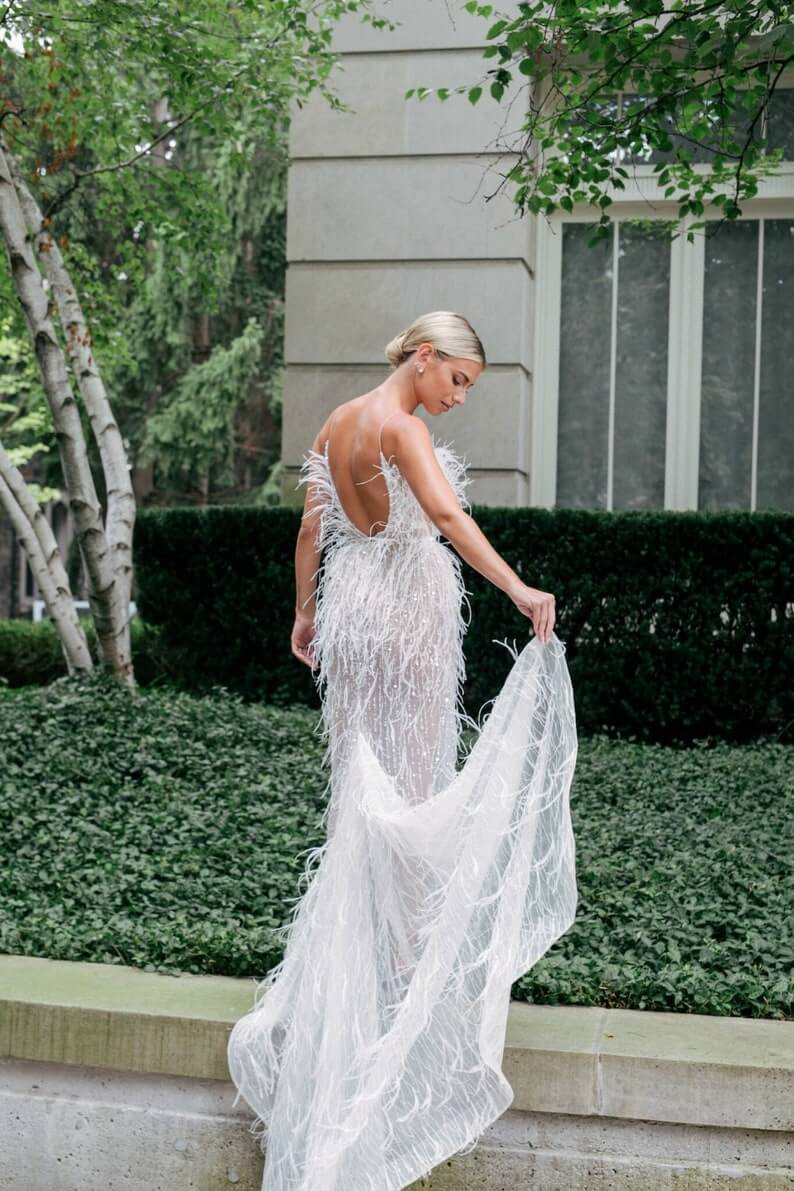 The Feather Effect 02 - 30 Chic Lesbian Wedding Dresses That Make Your Bridal Look Authentic The Feather Effect 02 - 30 Chic Lesbian Wedding Dresses That Make Your Bridal Look Authentic Gay Wedding Guide