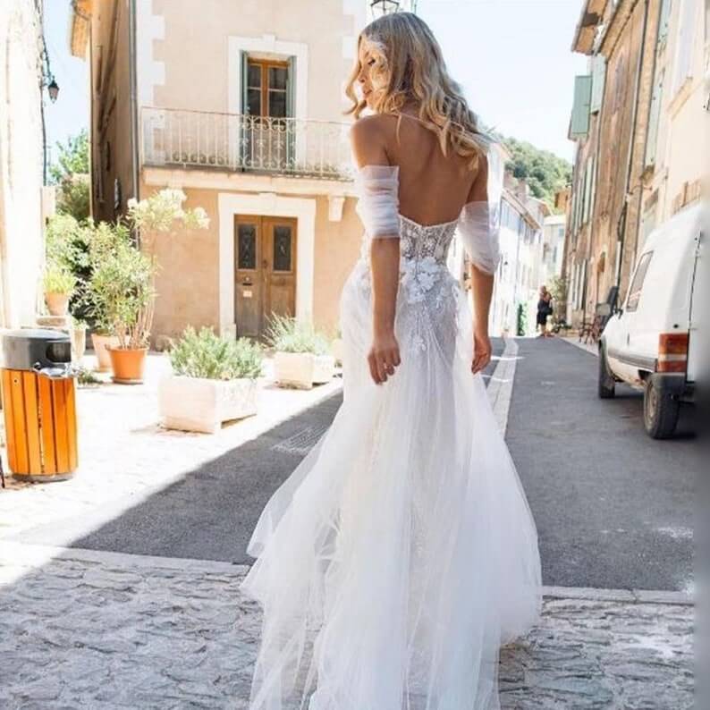Pleated Sleeve Off The Shoulder 2 Lesbian Wedding Dress - 30 Chic Lesbian Wedding Dresses That Make Your Bridal Look Authentic Pleated Sleeve Off The Shoulder 2 Lesbian Wedding Dress - 30 Chic Lesbian Wedding Dresses That Make Your Bridal Look Authentic Gay Wedding Guide