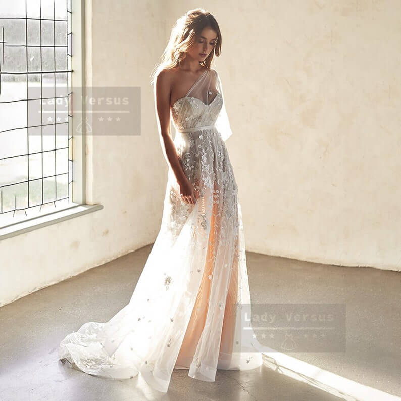 The Asymmetric Goddess Look 1 Lesbian Wedding Dress - 30 Chic Lesbian Wedding Dresses That Make Your Bridal Look Authentic The Asymmetric Goddess Look 1 Lesbian Wedding Dress - 30 Chic Lesbian Wedding Dresses That Make Your Bridal Look Authentic Gay Wedding Guide