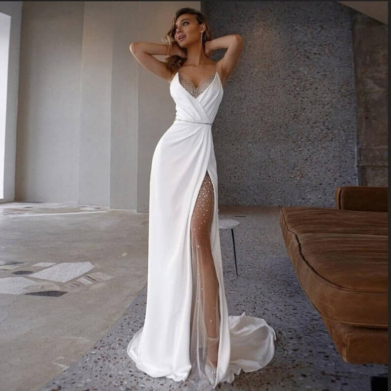 The Sexy Open Slit 2 Lesbian Wedding Dress - 30 Chic Lesbian Wedding Dresses That Make Your Bridal Look Authentic The Sexy Open Slit 2 Lesbian Wedding Dress - 30 Chic Lesbian Wedding Dresses That Make Your Bridal Look Authentic Gay Wedding Guide
