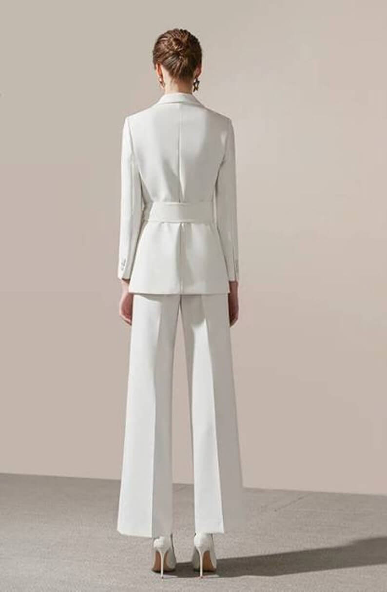 White Belted 2 Piece Wide Leg Pants Suits 2 Lesbian Wedding Suit - 30 Amazing Lesbian Wedding Suits To Look Stunning On Your Big Day White Belted 2 Piece Wide Leg Pants Suits 2 Lesbian Wedding Suit - 30 Amazing Lesbian Wedding Suits To Look Stunning On Your Big Day Gay Wedding Guide